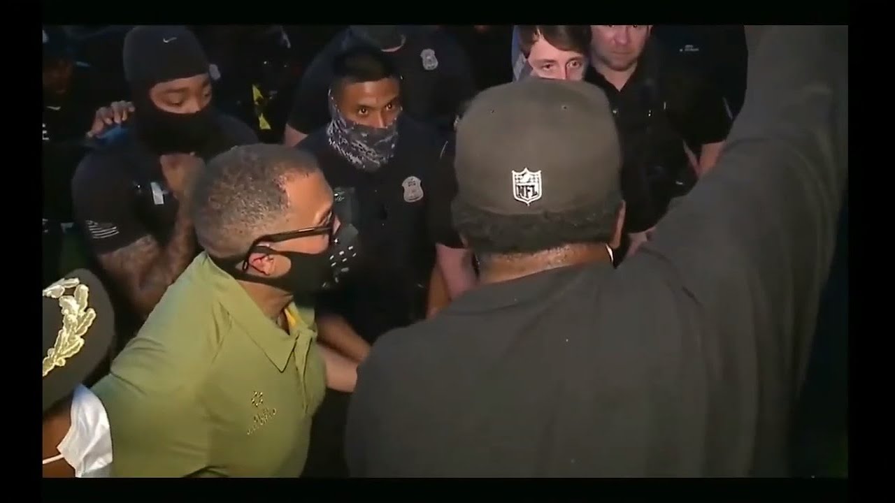 Detroit’s Tough Talking Top Cop Takes a Knee